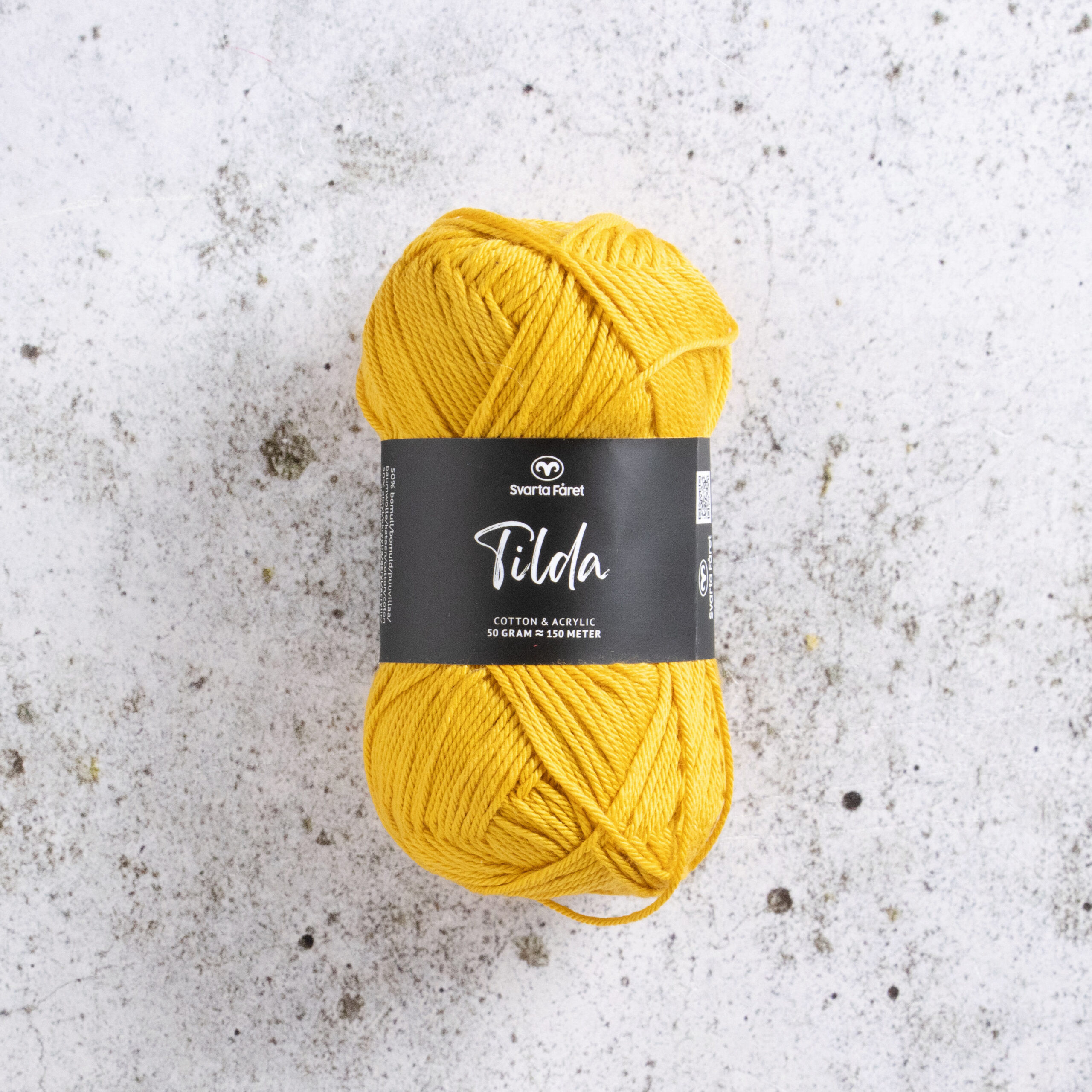 Tilda 597 Gold Digger 50% Bomull och 50% akrylgarn Svarta Fårets Tilda har du alldeles säkert hört talas om! Tilda är ett härligt blandgarn med bomull och akryl – vilket ger den där alldeles speciella och otroligt mjuka känslan. Detta omtyckta garn är dessutom slitstarkt, och passar lika bra till stickning som virkning – både för plagg och inredningsdetaljer.
